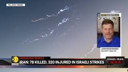 Israel-Iran war | Iran missile strike: 2 trapped, 14 injured in central Israel News Clip