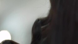 Beautiful girl does a hairstyle in a beauty salon Stock Footage