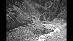 View of Andes Mountains from a moving train News Clip