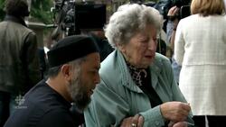 Muslim cleric comforts elderly Jewish woman at memorial site News Clip