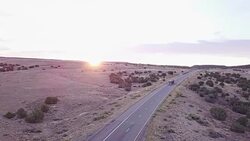 Aerial Drone Footage of Semi-Trucks Rolling Down the Highway Stock Footage