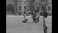 Elizabeth presents her Royal Standard, the colors that will be carried on her inauguration in June, to Grenadiers at Windsor Castle News Clip