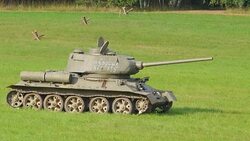 A small military tank on the grassy park in Valga Estonia Stock Footage