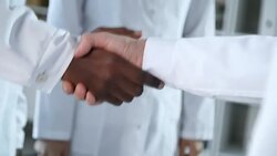 Hands of Multi Ethnic Doctors at Meeting Stock Footage