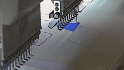 Automatic modern sewing machine embroider a pattern,Industrial embroidery equipment. Textile Manufacturers.Industrial textile factory,Textile Factory. Textile Industry. Stock Footage