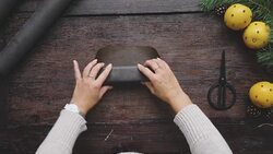 Swedish woman wrapping Christmas presents Stock Footage