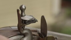Cocking a musket Stock Footage