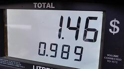 Big screen of rising gas prices on pump screen Stock Footage