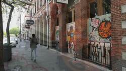 Passersby check out virus-themed murals in Austin Instructional Video