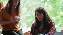 Two Biologists Explaining some Work to Each other Stock Footage