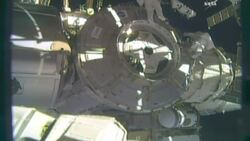 NASA astronauts lose piece of debris shield during spacewalk News Clip