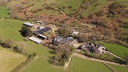 Drone aerials over North Wales countryside and farmland News Clip