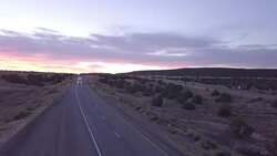Aerial Drone Footage of Semi-Trucks Rolling Down the Highway Stock Footage