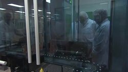 Boris Johnson touring a vaccine lab News Clip