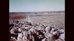 VIEW OVER DESERT FROM PLANE WINDOW, 1950s Stock Footage
