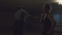 Man and a woman are dancing in the studio Stock Footage