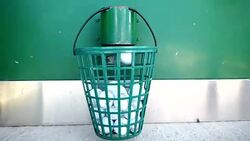 Machine Filling the Basket with Golf Balls on Driving Range Stock Footage