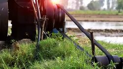 Watering in the field Stock Footage