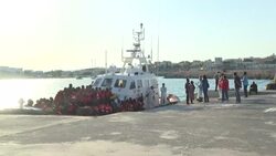CLEAN : Migrants rescued by Italian Coast Guard arrive on Lampedusa island News Clip