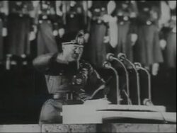 RESEARCH IMW996421 Mussolini gives a speech in German, at the Berlin Olympic Stadium, 1937, Nazi parade at night Stock Footage