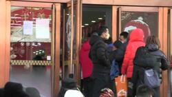 CLEAN : Shoppers queue overnight as land of the panda runs out of Olympic mascots News Clip