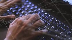 CU : Hand typing on a keyboard laptop with communication network Stock Footage