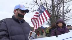 North Carolina residents rally outside Trump event Instructional Video