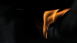 The orange flame in the charcoal stove. Stock Footage