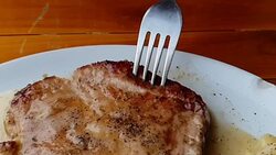Slow motion of Meat steak (Beef or Pork steak) Stock Footage