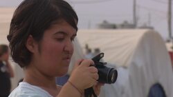 Yazidi with dwarfism captures life in camp News Clip