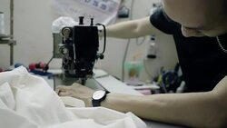 Real Life : Fashion designer uses a sewing machine Stock Footage