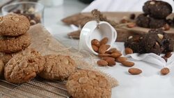 Tasty Chip cake biscuits cookies arranged on table Stock Footage