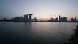 Timelapse of business district of Singapore city downtown at sunset Stock Footage