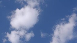 White fluffy clouds in the vast blue sky. Stock Footage