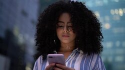 Businesswoman Using Mobile Outdoors - Portrait Stock Footage