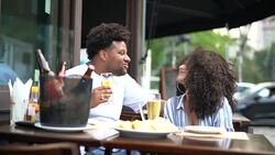 Happy young couple drinking beer in a bar - Portrait Stock Footage
