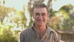 Middle aged farmer on farmland Stock Footage