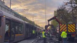 Burned bus wreckage removed from O'Connell Street as Dublin cleans up after night of looting and riots News Clip