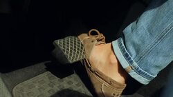 Man foot pressing the car brake pedal Stock Footage