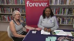 People having blood pressure tested in a library News Clip