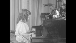 Little girl plays piano in DC News Clip