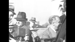 Activity around Franklin D. Roosevelt, seated in car following speech in Rhode Island News Clip