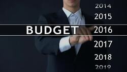2020 budget, businessman selects file on virtual screen, annual financial report Stock Footage