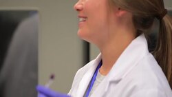 Scientist Explaining Her Findings in the Laboratory Stock Footage