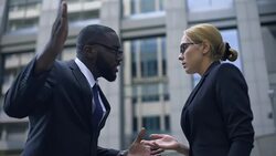 Male boss scolding subordinate, employee justifying herself, business ethics Stock Footage