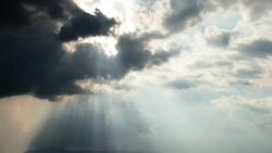 Time lapse sunbeam through the dark cloud on the sky evening. Stock Footage