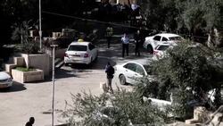 CLEAN : Israeli security forces carry body of a man killed after firing on officers News Clip