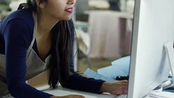 Hispanic Fashion Designer Working with Computer Stock Footage