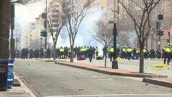 Police push Trump inauguration protesters back and fire stun grenades at them News Clip