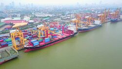 Aerial view of container ships and lifting cranes in the logistic Port Stock Footage